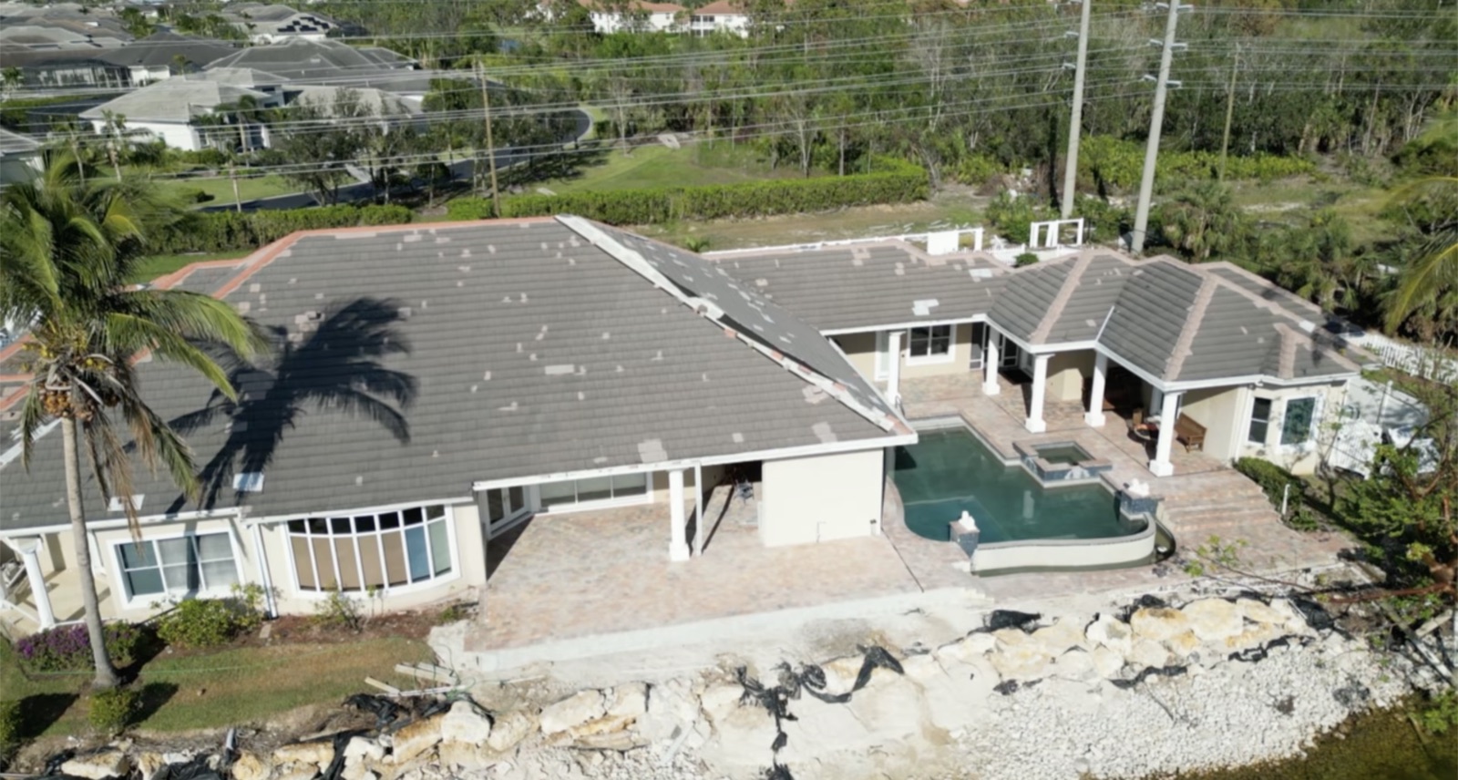 Storm damage roof restoration project in progress in Southwest Florida