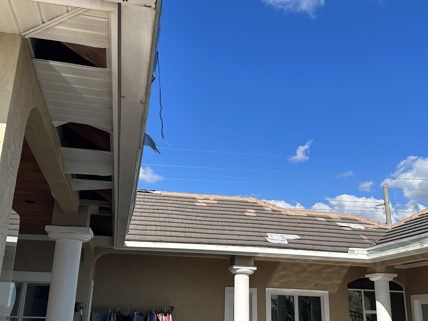 Storm damage assessment determining whether repair or replacement is needed in Southwest Florida